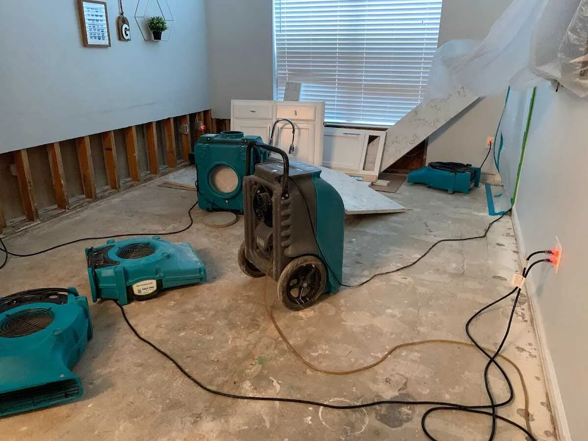 Dehumidifier in flood-cut room for Water Damage Restoration in Cambridge